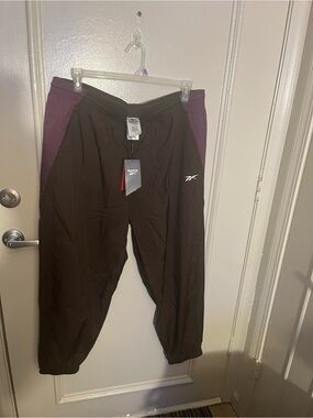 Reebok Brown Track Pants with Purple Side Panels. Brand new with tags.